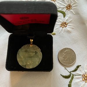 Chinese jade rabbit pendant. 14kt clasp